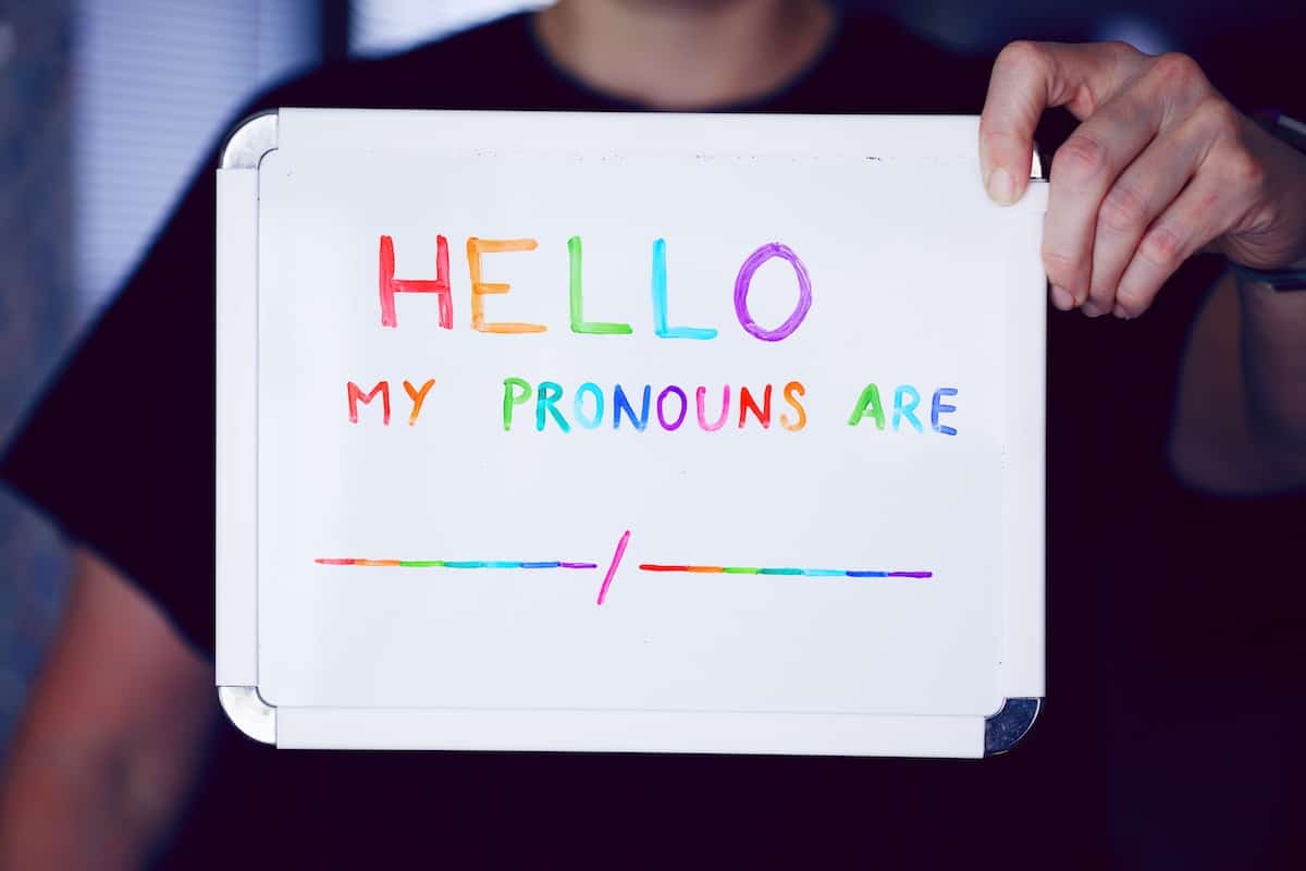 Hello my pronouns are written in rainbow ink on whiteboard