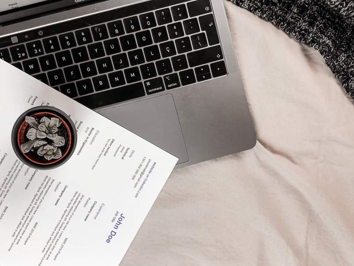 resume sitting on laptop